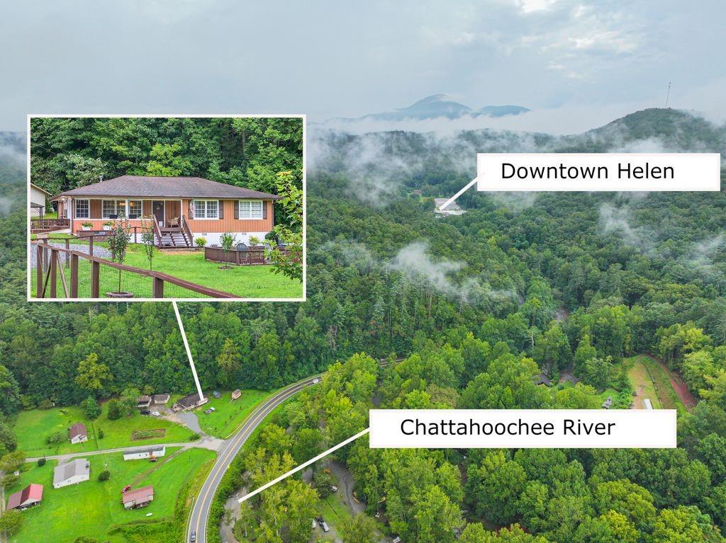 a sign that is sitting on a lush green field