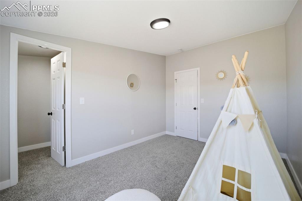 35125 Book Road Yoder, CO 80864 - Photo 34 of 45 a view of room with window and stairs