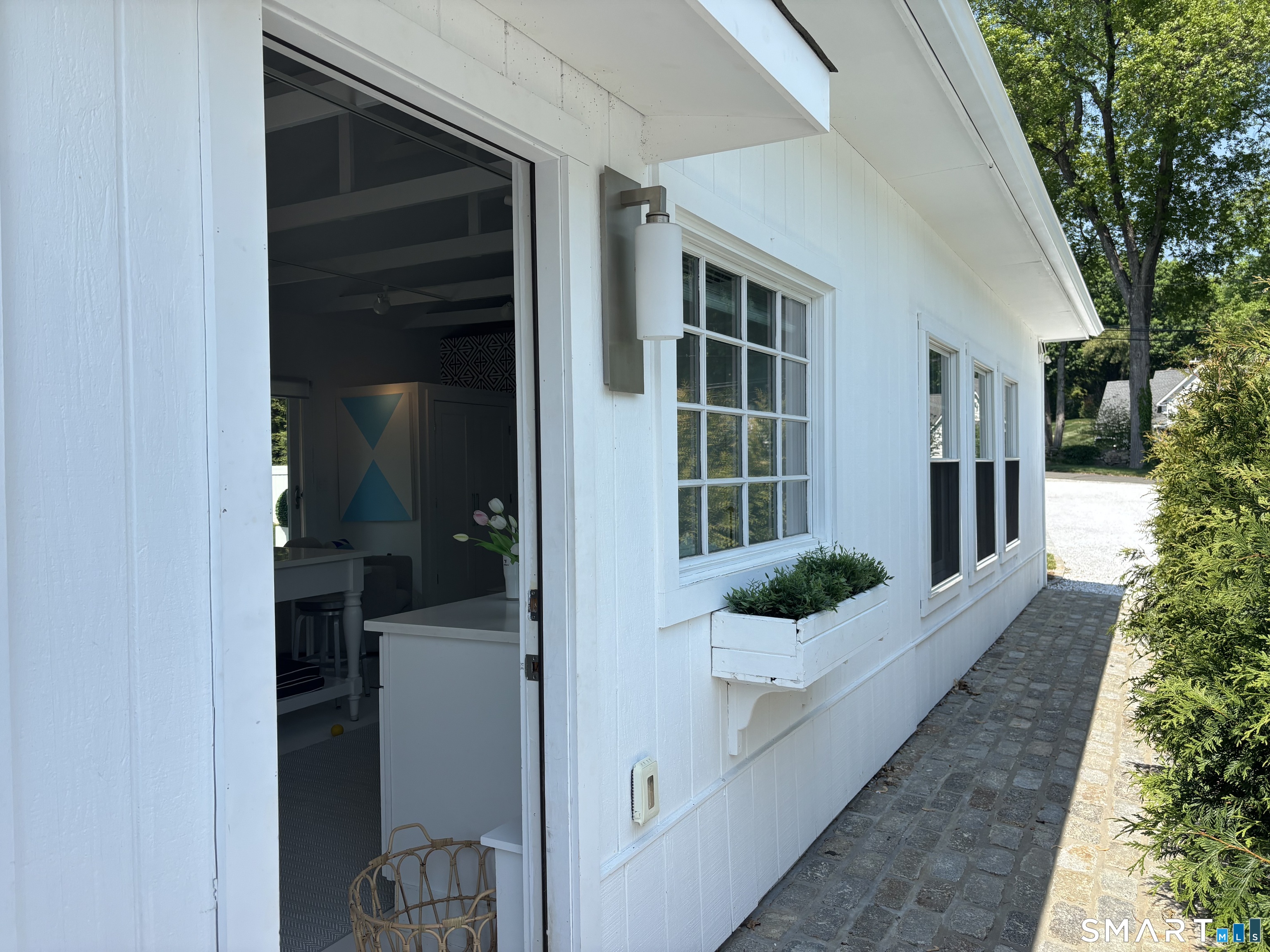 4 A Stoneboat Road Westport, CT 06880 - Photo 6 of 24 a front view of a house with a yard