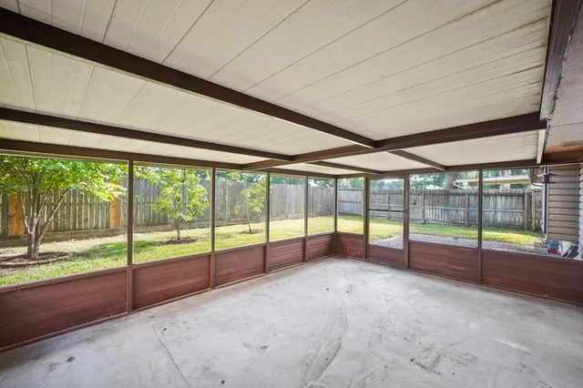 a view of an empty room with window