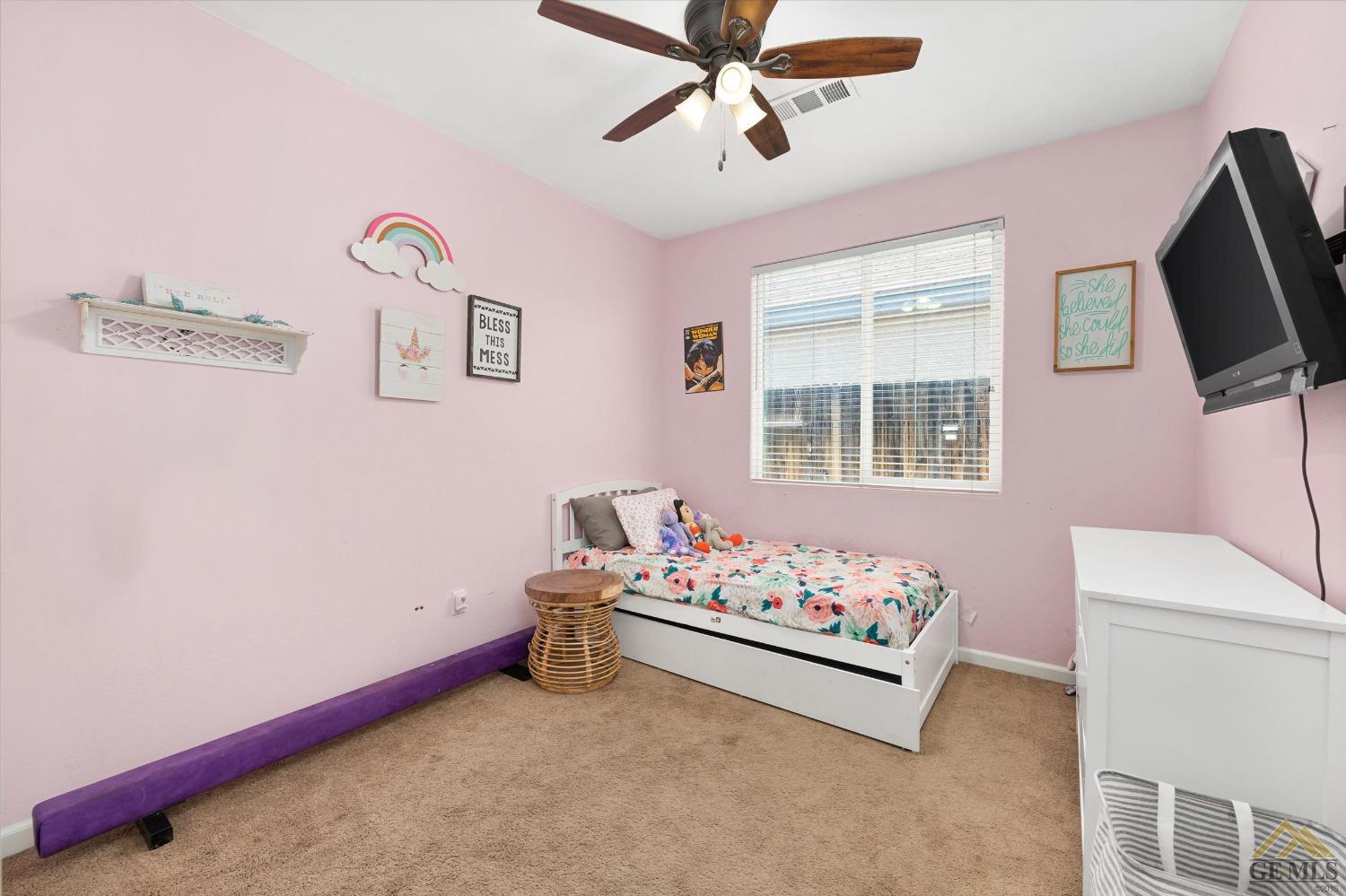 Undisclosed Address Bakersfield, CA 93314 - Photo 22 of 28 a bedroom with furniture and window