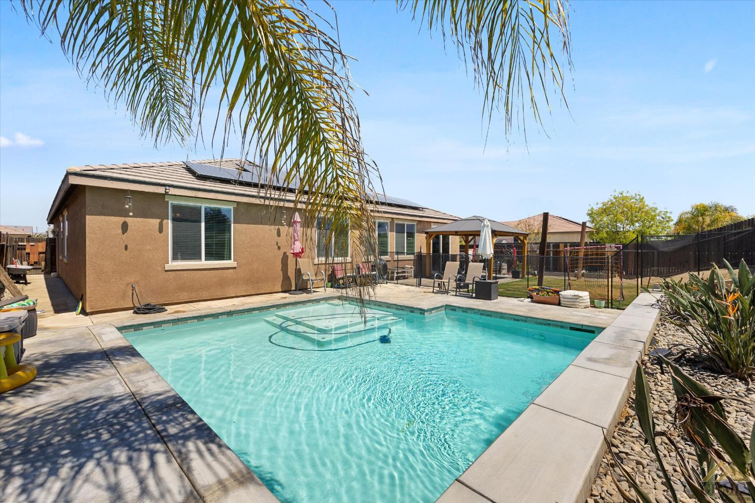 Undisclosed Address Bakersfield, CA 93314 - Photo 28 of 28 a swimming pool with outdoor seating yard and barbeque oven