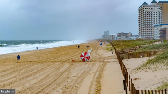 a view of a swimming pool and an outdoor space