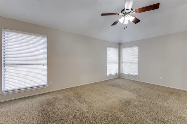 a large bathroom with a tub a sink a mirror and a shower