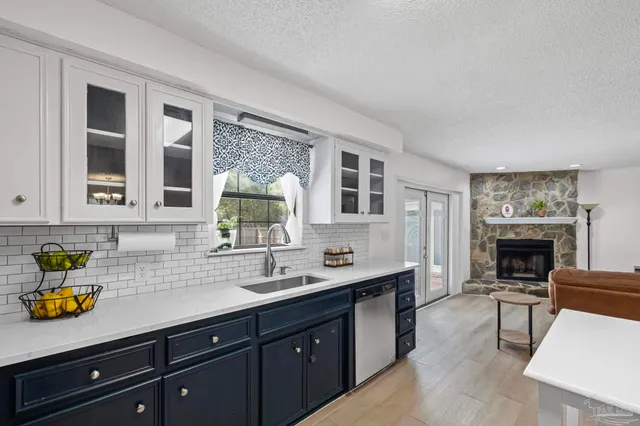 a view of hallway with wooden floor