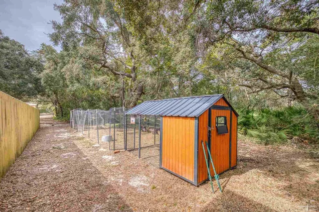 a house with trees in front of it