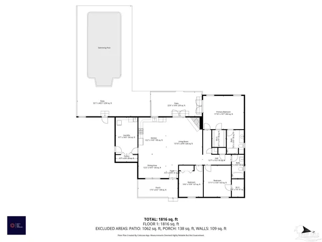 an aerial view of a house with a yard and lake view