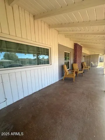 a view of an empty room with a fireplace