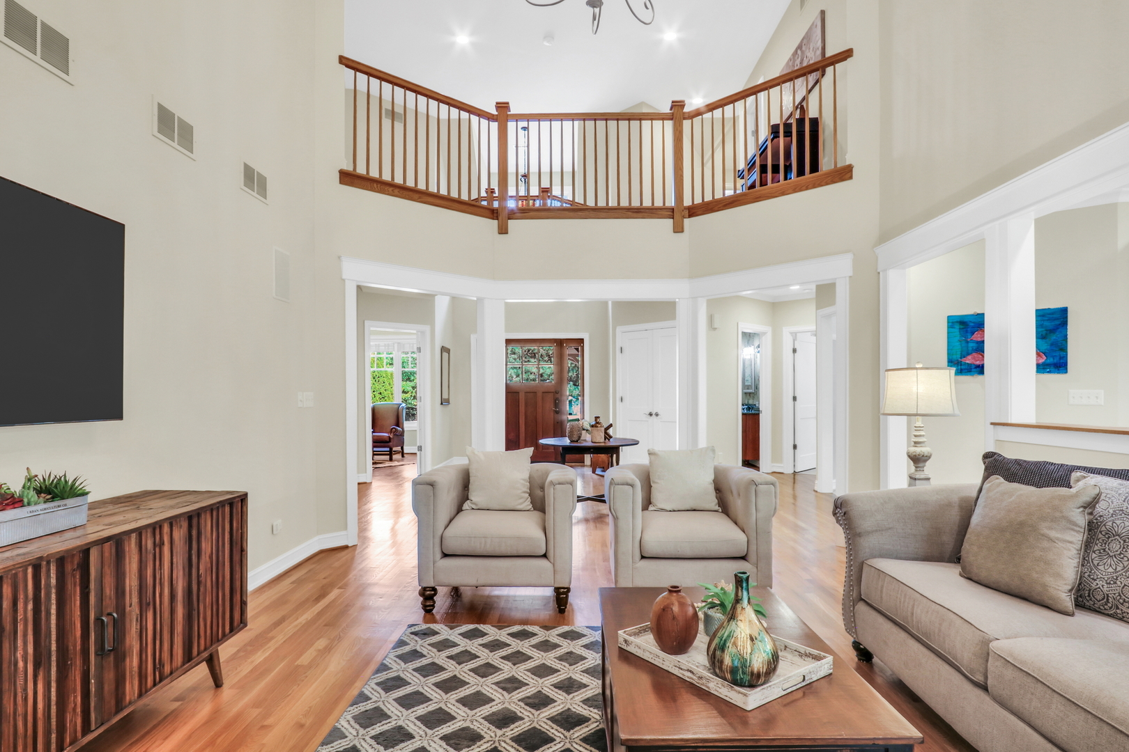 5684 Wolf Road Western Springs, IL 60558 - Photo 14 of 51 a living room with furniture a rug and a window