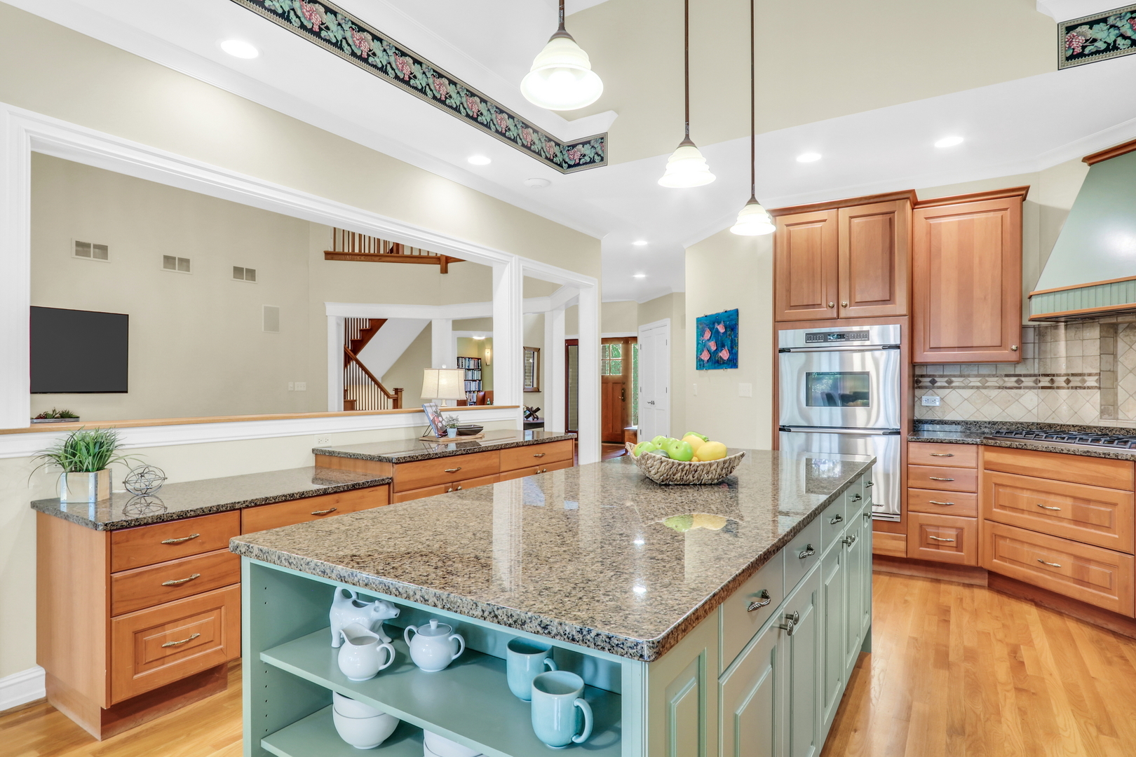 5684 Wolf Road Western Springs, IL 60558 - Photo 19 of 51 a kitchen with stainless steel appliances granite countertop a sink counter space and cabinets