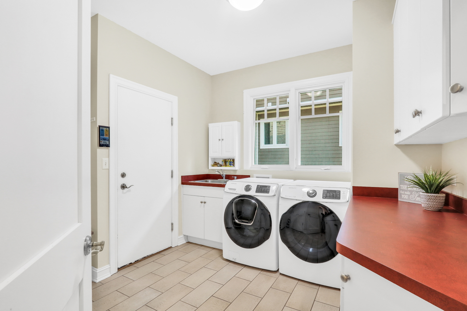 5684 Wolf Road Western Springs, IL 60558 - Photo 27 of 51 a utility room with dryer and washer
