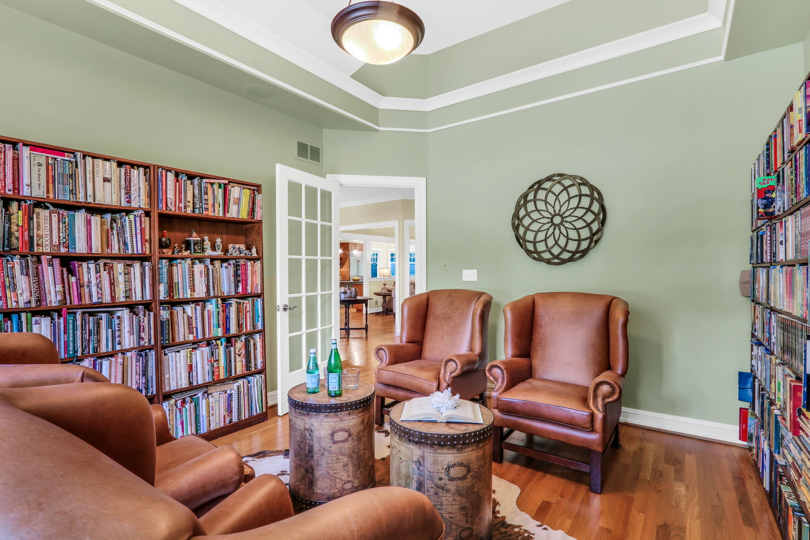 5684 Wolf Road Western Springs, IL 60558 - Photo 8 of 51 a living room with furniture a bookshelf and a window