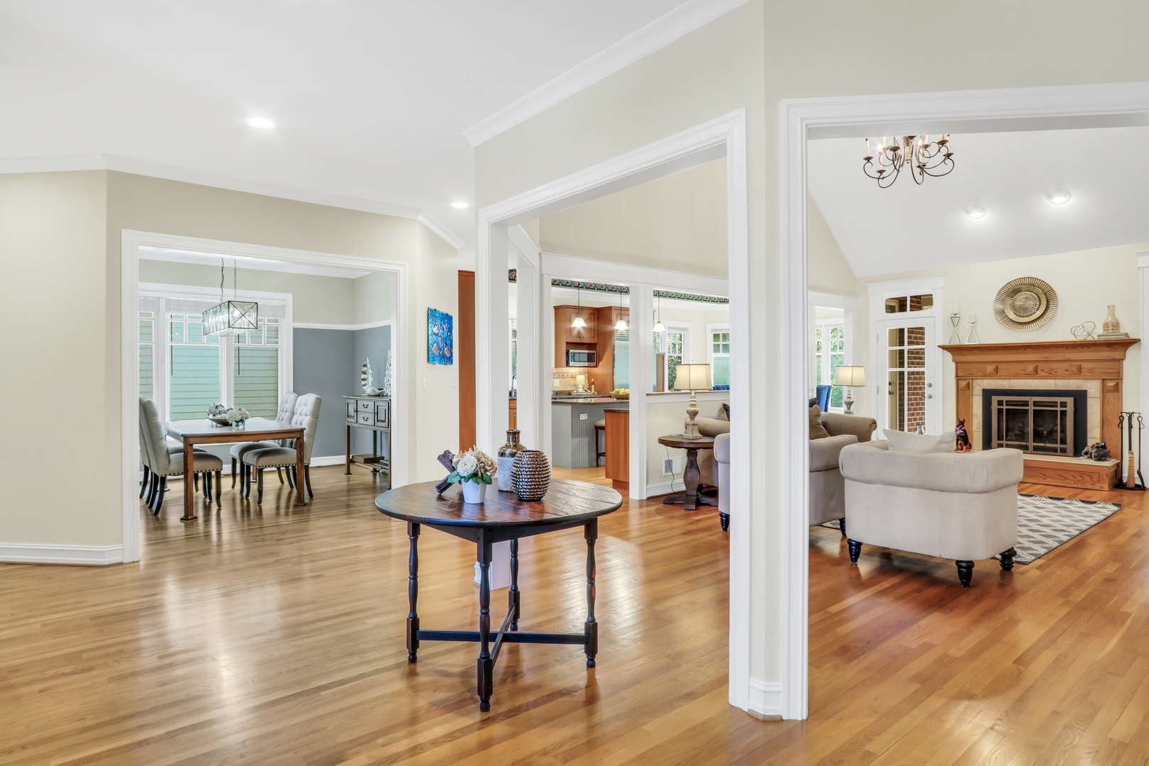 5684 Wolf Road Western Springs, IL 60558 - Photo 9 of 51 a living room with fireplace furniture and a table