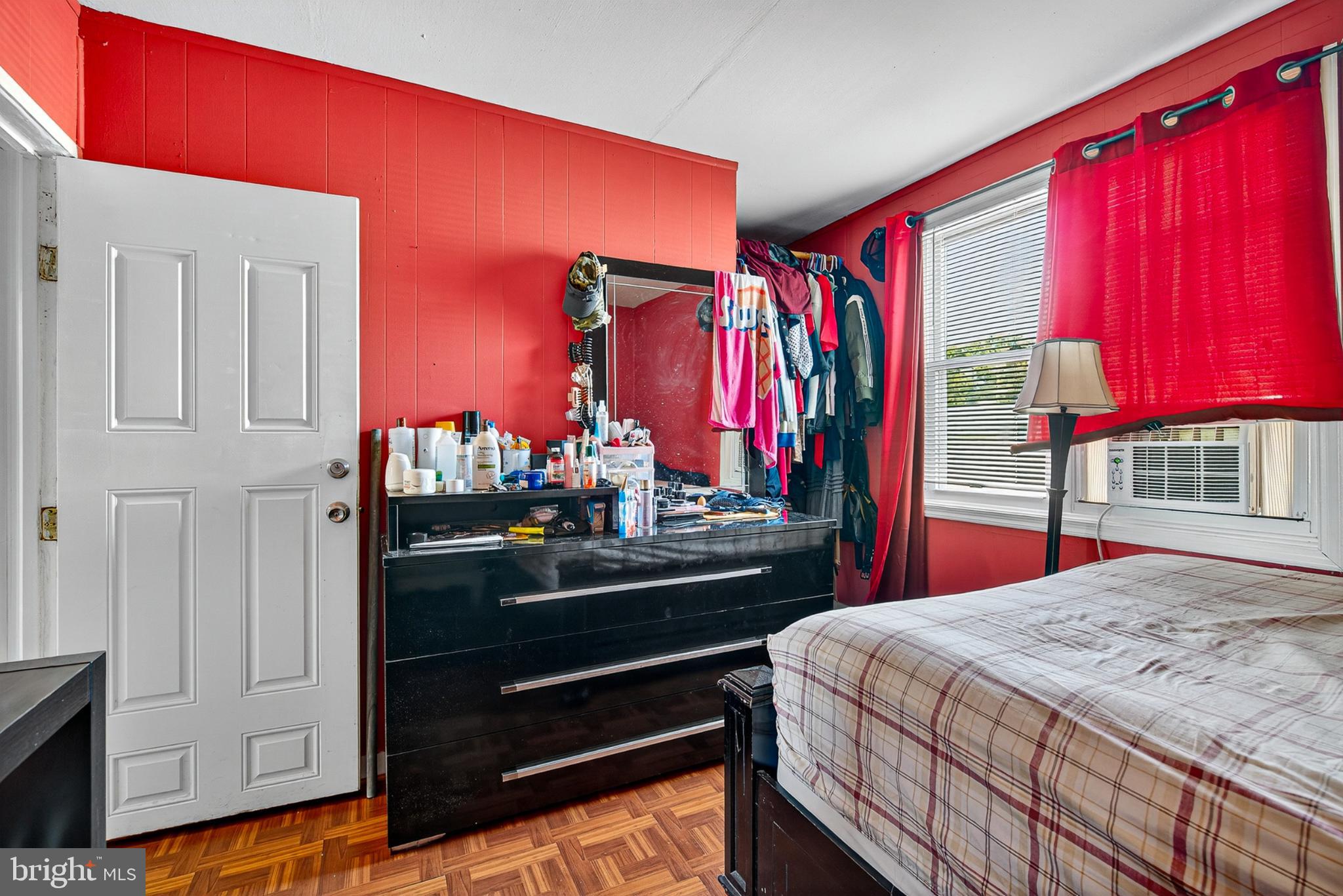 1109 Quantril Way Baltimore, MD 21205 - Photo 13 of 18 Vibrant bedroom with bold red accents.