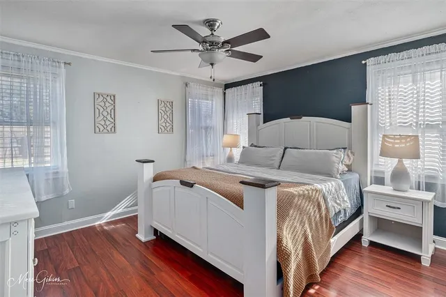 a bed room with a bed and a window