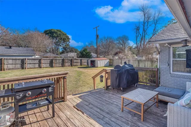 a view of a chairs on the roof deck