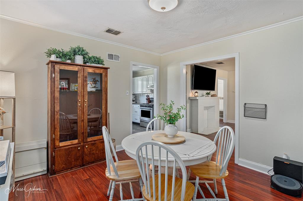 232 Roma Drive Shreveport, LA 71105 - Photo 8 of 21 a view of a dining room with furniture window and wooden floor