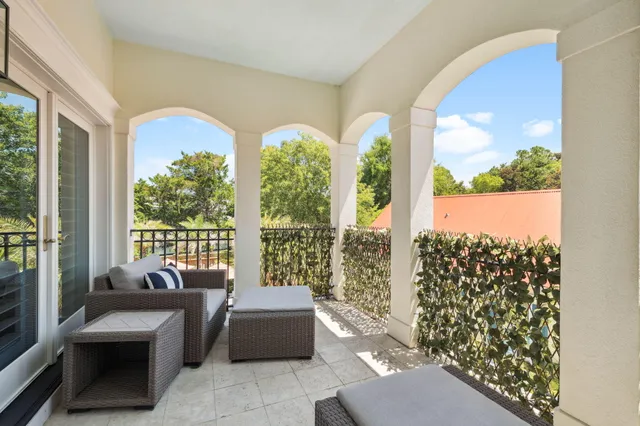 a spacious bedroom with bed and a window