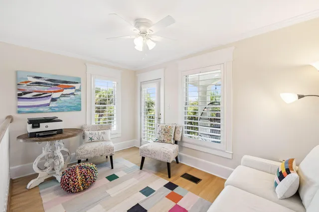 a view of a house with wooden fence