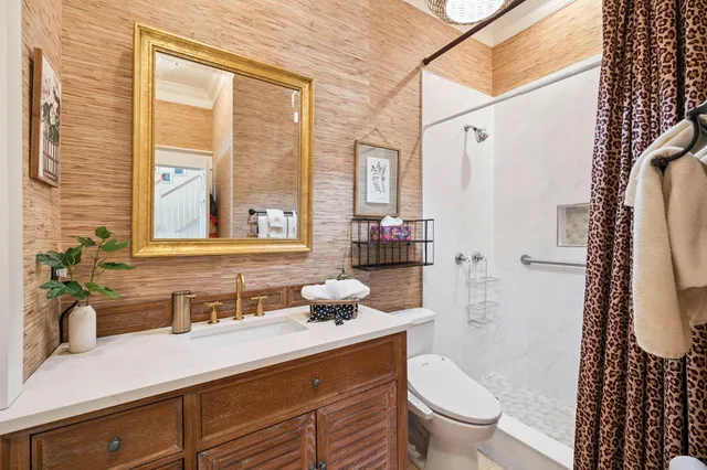 a kitchen that has a stove and a table chair in it