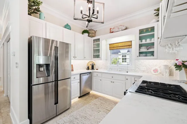 a very nice looking dining room with a table and chairs
