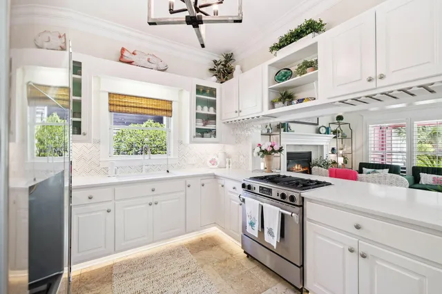 a dining room with furniture a rug and wooden floor