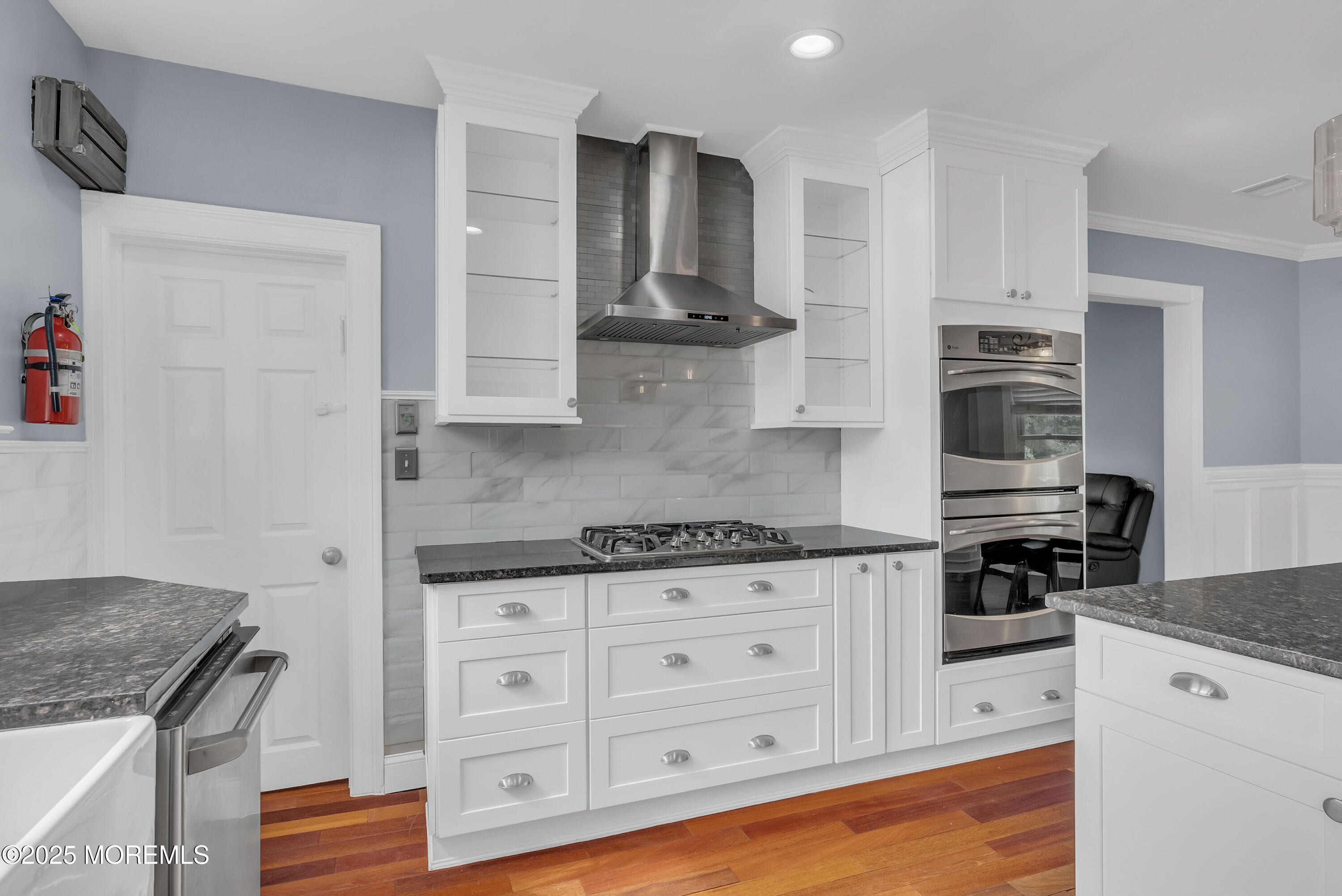 308 Monmouth Road West Long Branch, NJ 07764 - Photo 14 of 32 a kitchen with stainless steel appliances granite countertop a stove and a refrigerator