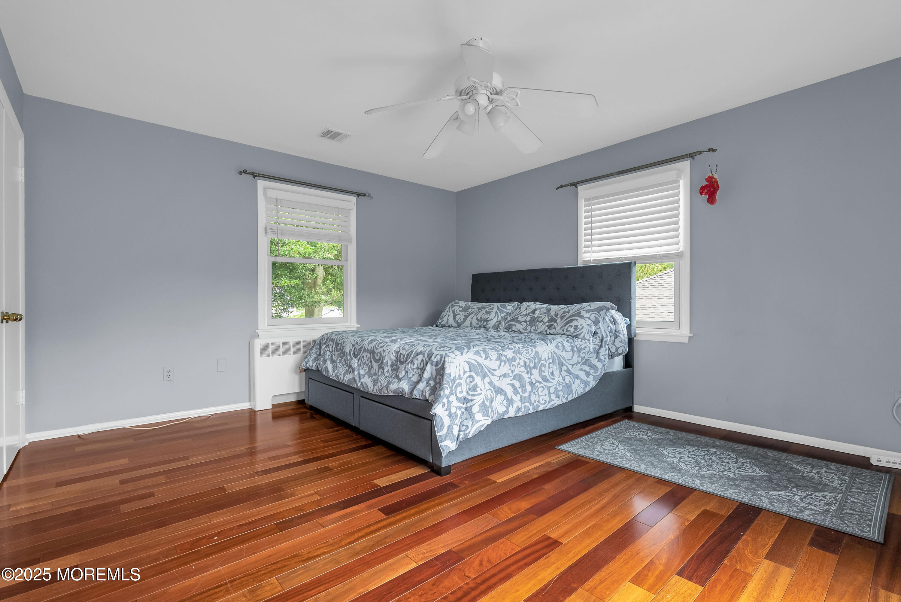 308 Monmouth Road West Long Branch, NJ 07764 - Photo 19 of 32 a bedroom with a bed and window