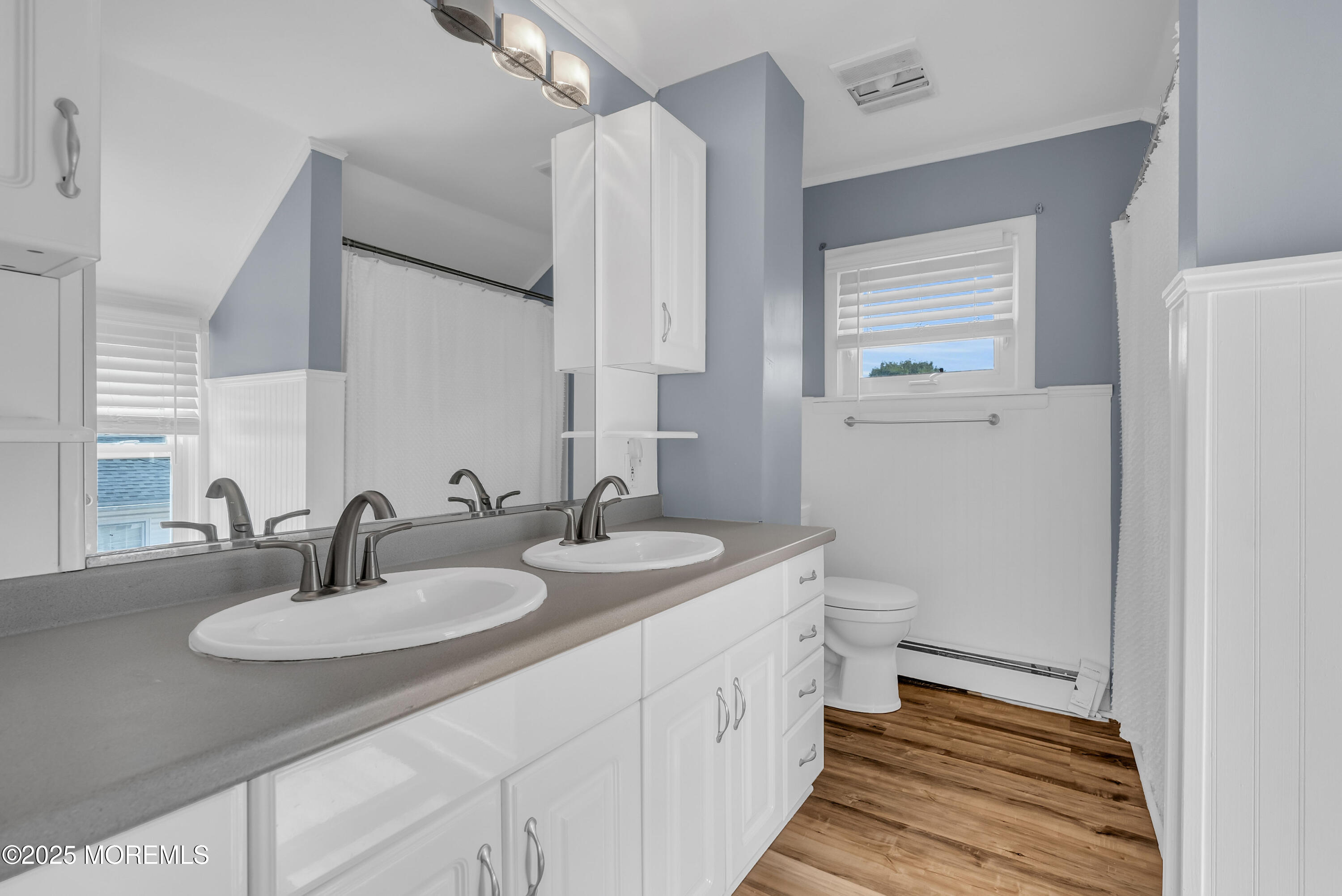 308 Monmouth Road West Long Branch, NJ 07764 - Photo 21 of 32 a bathroom with a sink and a mirror