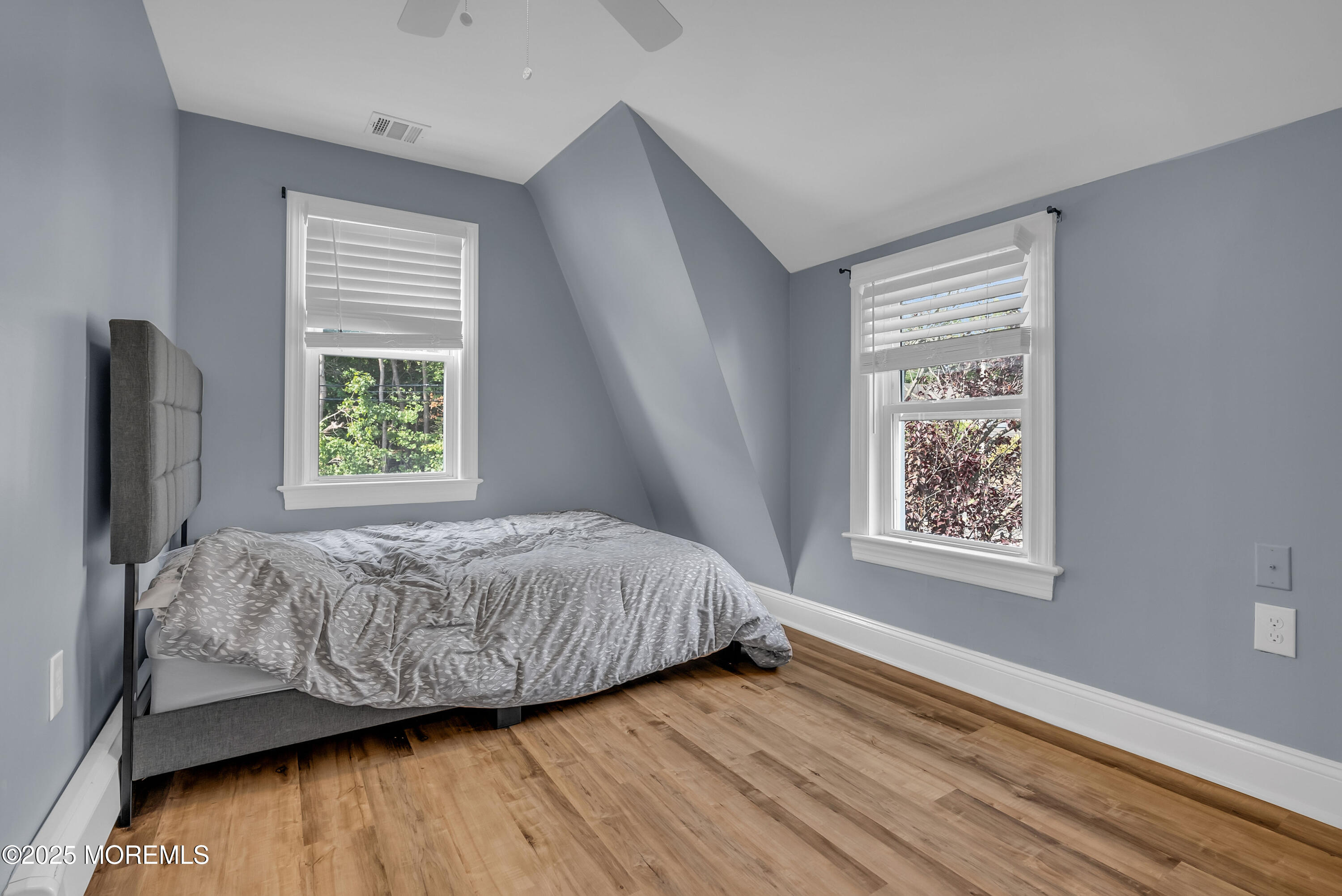 308 Monmouth Road West Long Branch, NJ 07764 - Photo 22 of 32 a bedroom with a bed and a window
