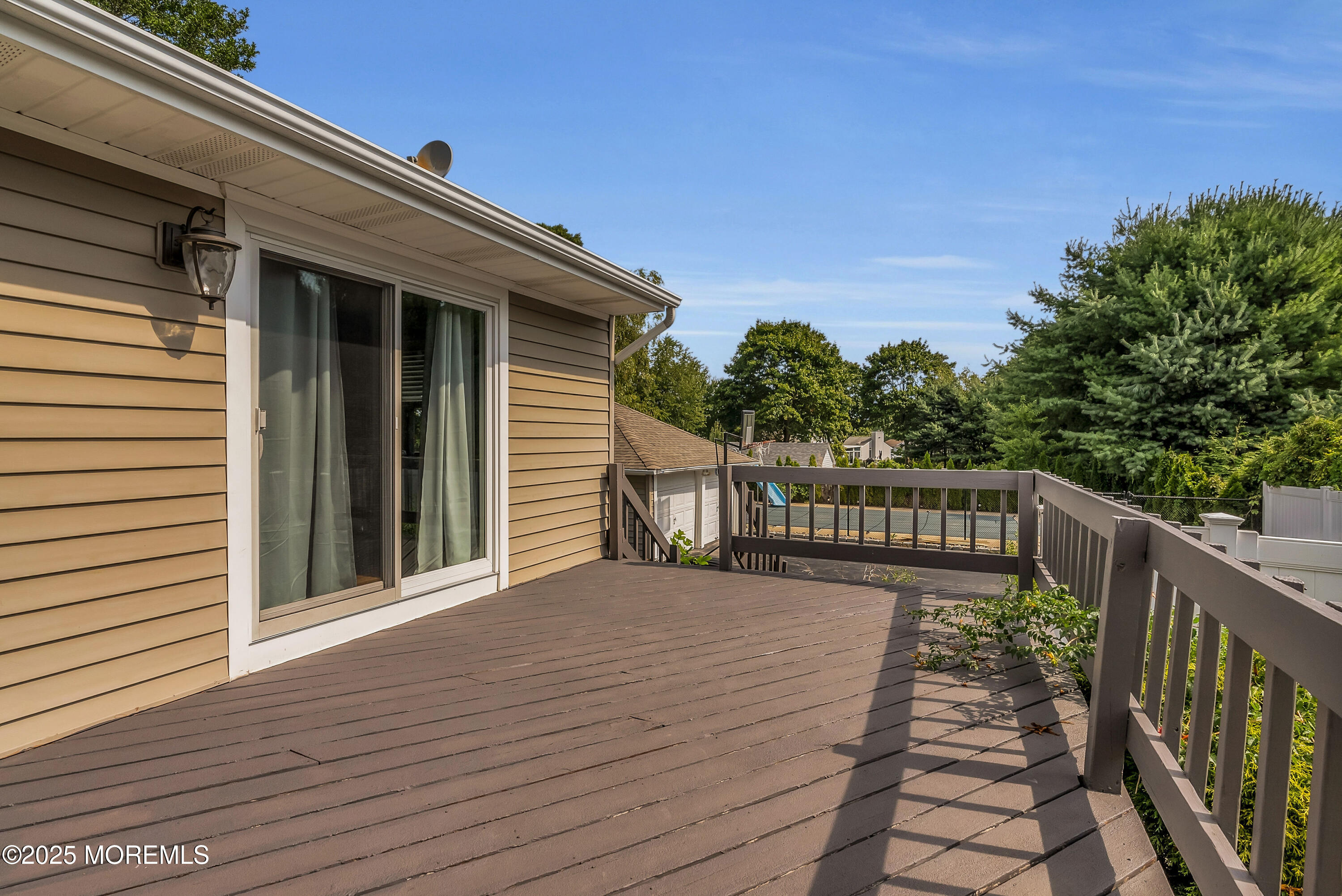 308 Monmouth Road West Long Branch, NJ 07764 - Photo 28 of 32 a view of a balcony with wooden floor