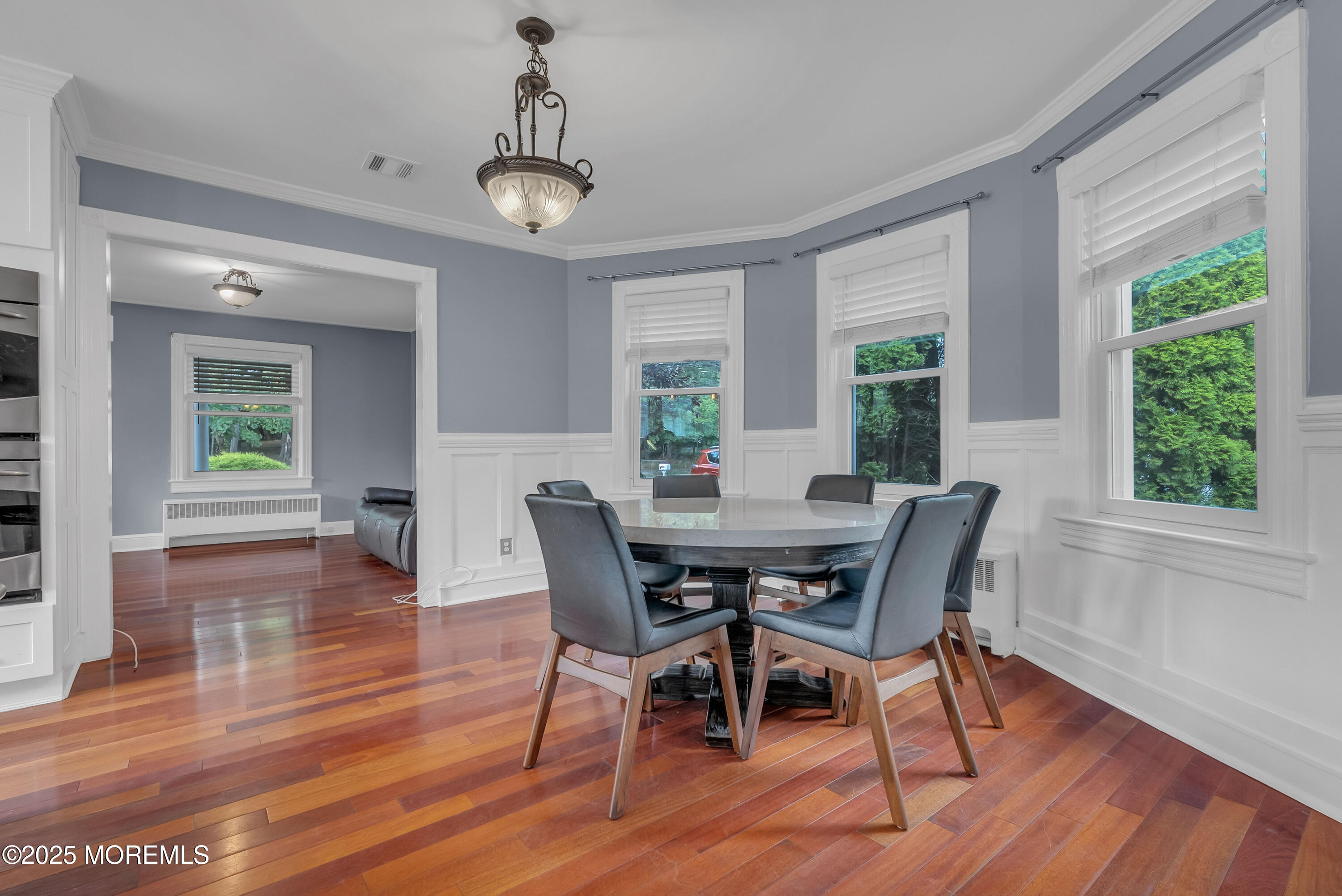 308 Monmouth Road West Long Branch, NJ 07764 - Photo 10 of 32 a view of a dining room with furniture window and wooden floor
