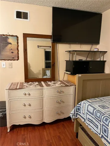 a room with a bed and furniture