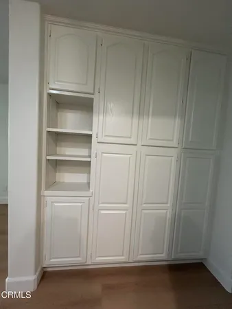 a view of an empty walk in closet