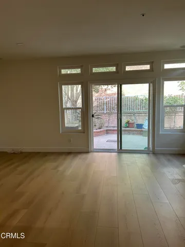 en empty room with windows