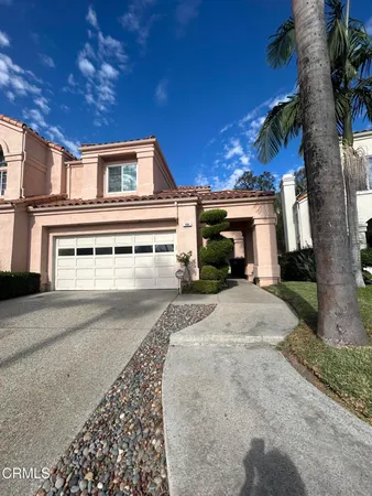 a view of a house with a patio