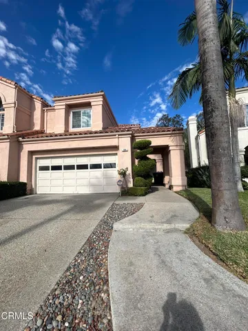 a view of a house with a patio