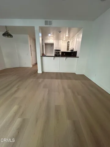 a view of a kitchen with a sink