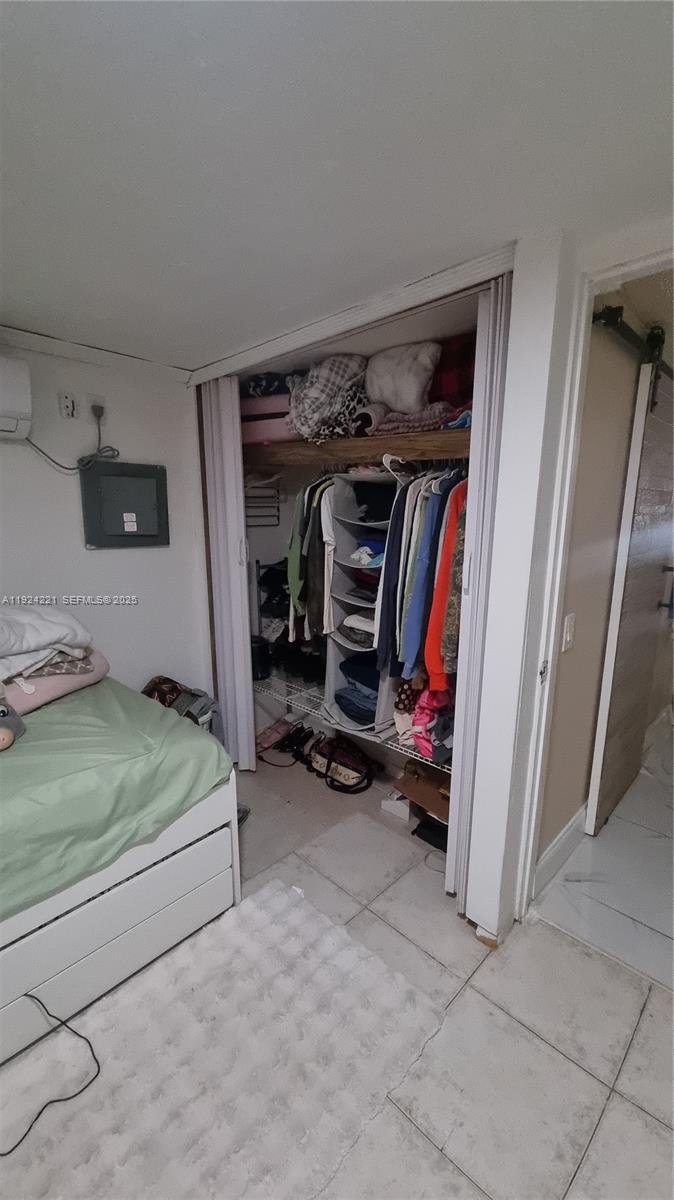 3170 Southwest 8th Street Miami, FL 33135 - Photo 17 of 33 a view of a room with gym equipment