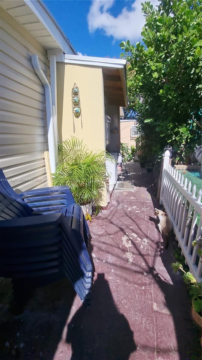 3170 Southwest 8th Street Miami, FL 33135 - Photo 26 of 33 a view of a backyard with sitting area