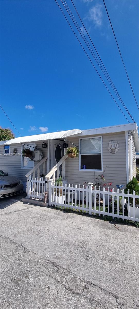 3170 Southwest 8th Street Miami, FL 33135 - Photo 29 of 33 a view of a house with porch