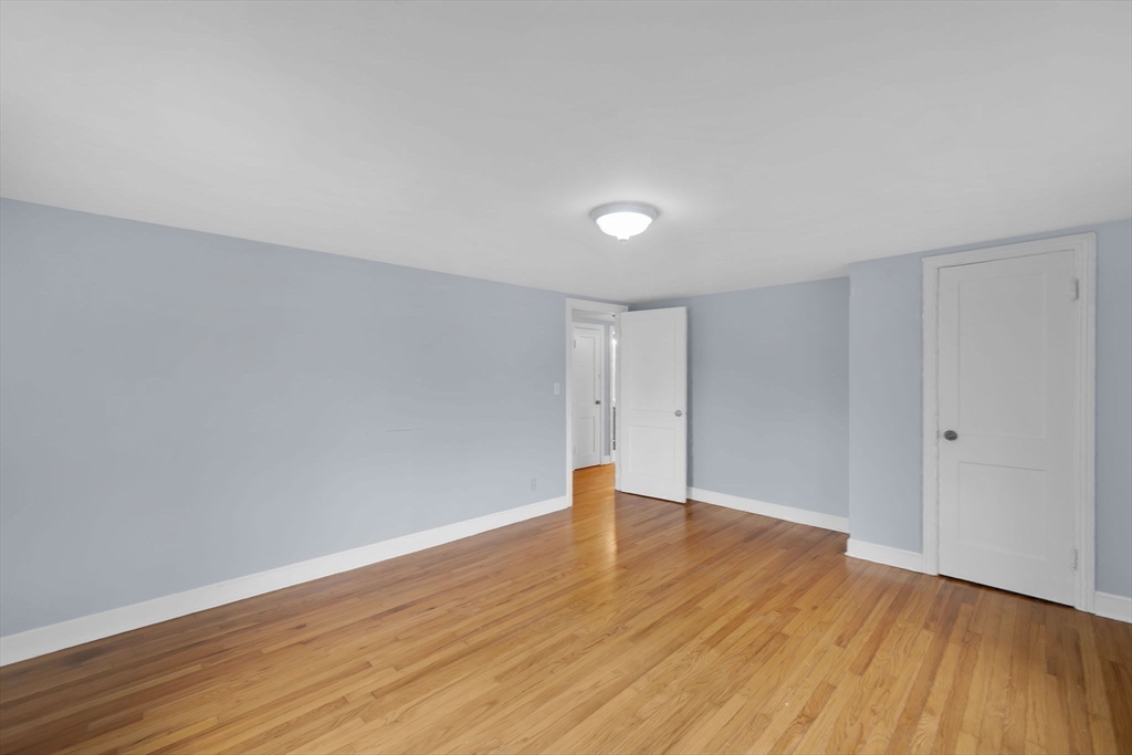 4 Leonard Road Stafford, CT 06076 - Photo 19 of 37 a view of an empty room with wooden floor