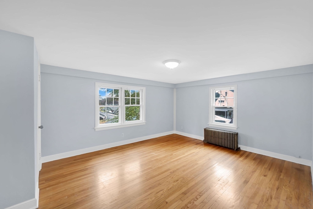 4 Leonard Road Stafford, CT 06076 - Photo 20 of 37 a view of a livingroom with wooden floor and a window