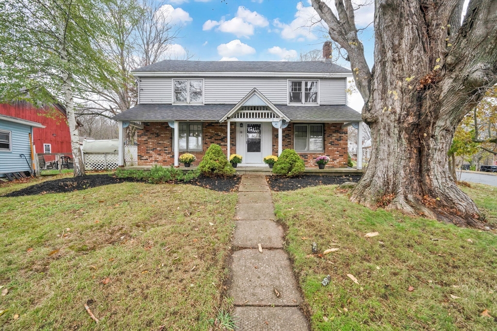 4 Leonard Road Stafford, CT 06076 - Photo 2 of 37 a front view of a house with garden