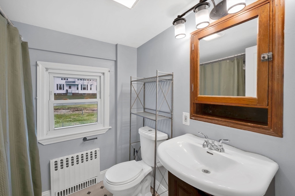 4 Leonard Road Stafford, CT 06076 - Photo 26 of 37 a bathroom with a sink a toilet and shower