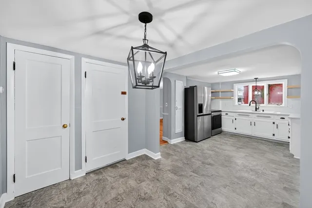a view of a hallway with closet