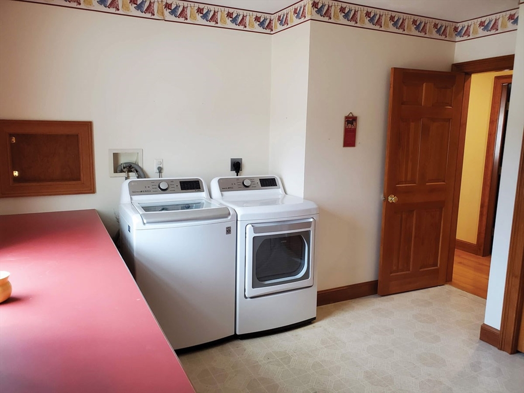 64 Arch Street Westborough, MA 01581 - Photo 17 of 42 a utility room with dryer and washer
