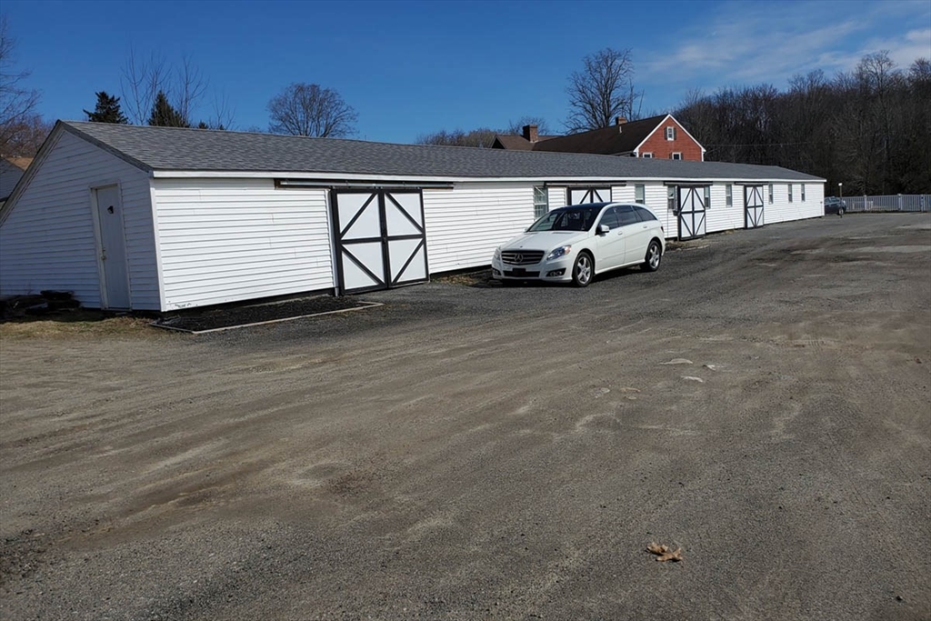64 Arch Street Westborough, MA 01581 - Photo 40 of 42 a view of a car park in front of house