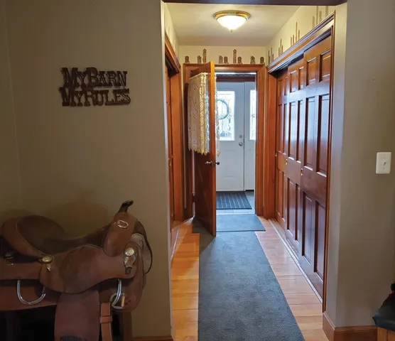 a view of hallway with furniture