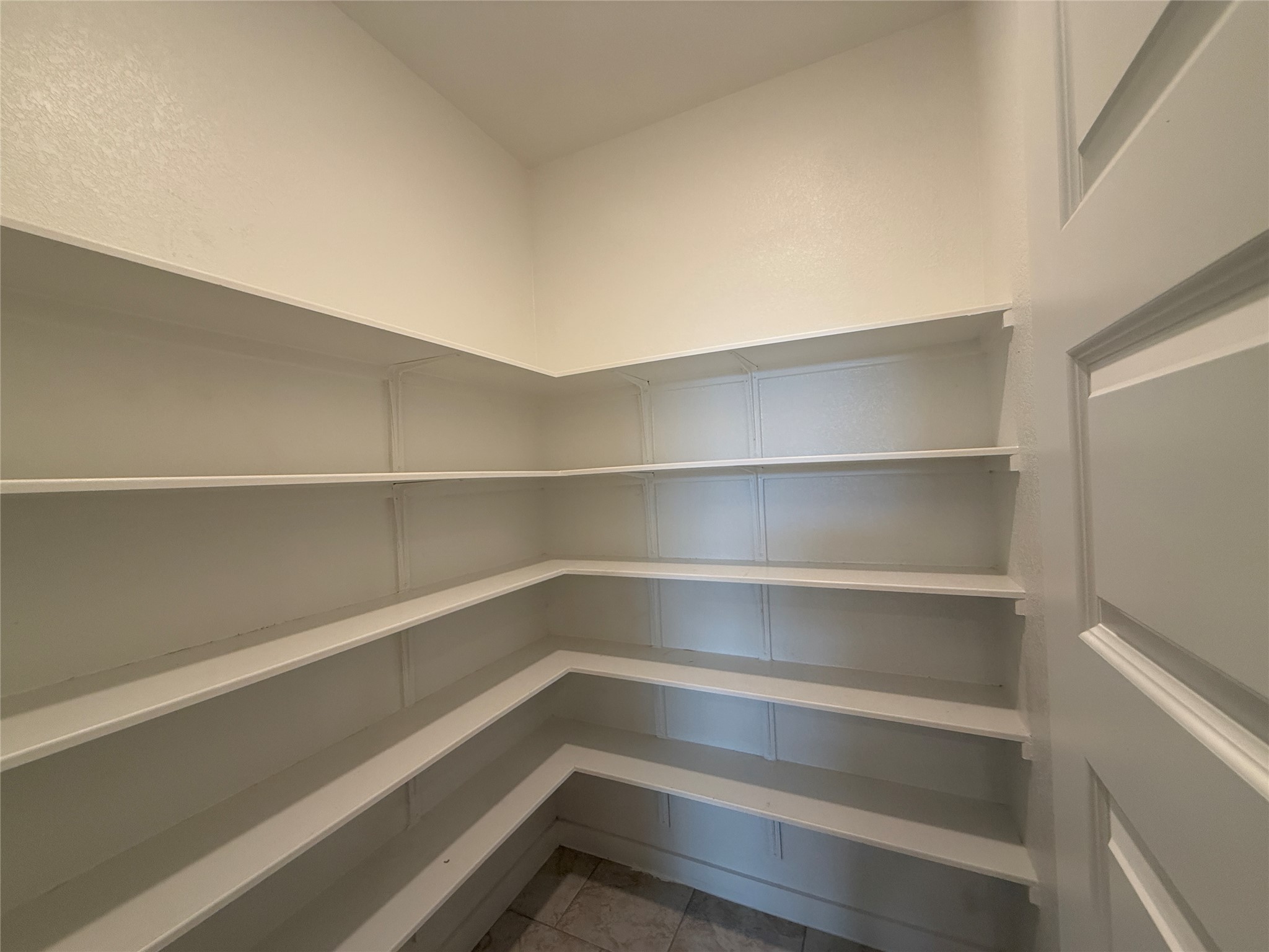 18300 Emu Lane Manor, TX 78653 - Photo 18 of 35 a storage room with wooden floor